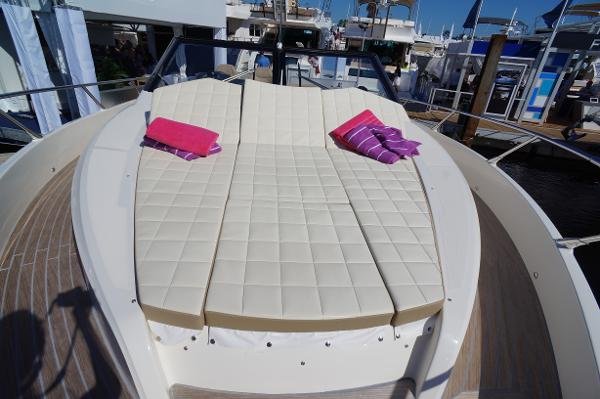 Slide: The Image of 2015 Absolute 40 STL yacht with sunbathing cushions and colorful pillows. - 10