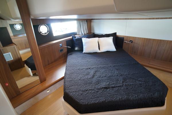 Slide: The Image of Luxurious bedroom in 2015 Absolute 40 STL yacht with modern wood finish. - 15