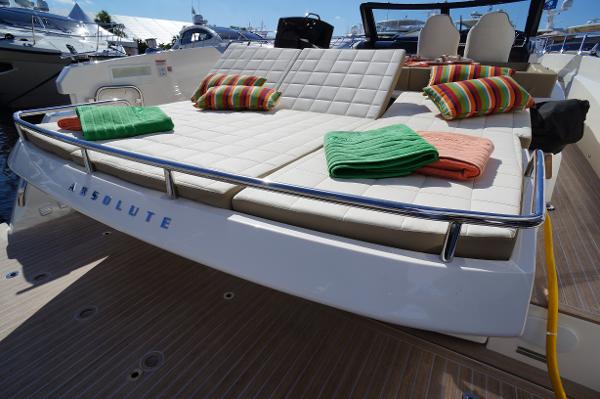 Slide: The Image of Luxury 2015 Absolute 40 STL yacht with sunbathing deck and colorful towels. - 16