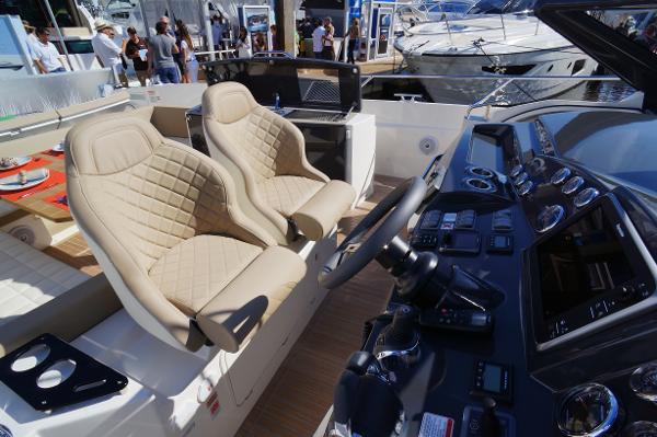 Slide: The Image of Luxury cockpit of 2015 Absolute 40 STL yacht with beige leather seats. - 18