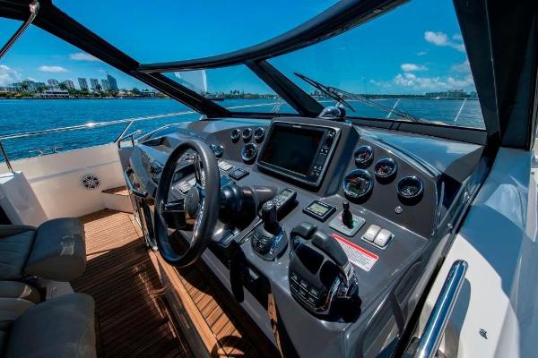 Slide: The Image of 2015 Absolute 40 STL yacht helm with navigation controls and ocean view. - 21