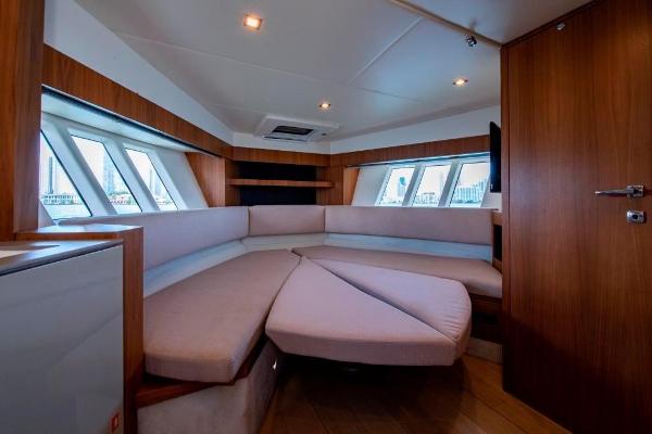 Slide: The Image of Interior of 2015 Absolute 40 STL yacht with modern seating and large windows. - 24