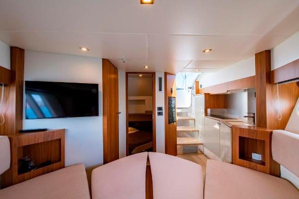 Slide: The Image of Interior of 2015 Absolute 40 STL yacht with modern furnishings and a flat-screen TV. - 25