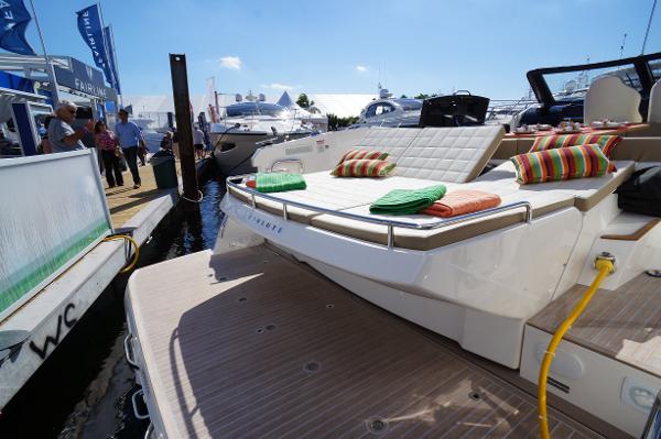 Slide: The Image of 2015 Absolute 40 STL yacht with sunbathing area at a marina. - 27