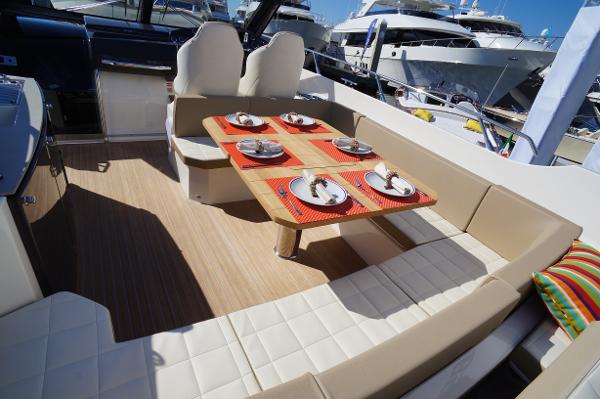 Slide: The Image of Luxurious dining area on a 2015 Absolute 40 STL yacht, set for four. - 30