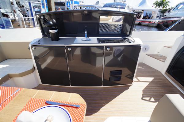 Slide: The Image of Outdoor kitchen on a 2015 Absolute 40 STL yacht with sink and grill. - 34