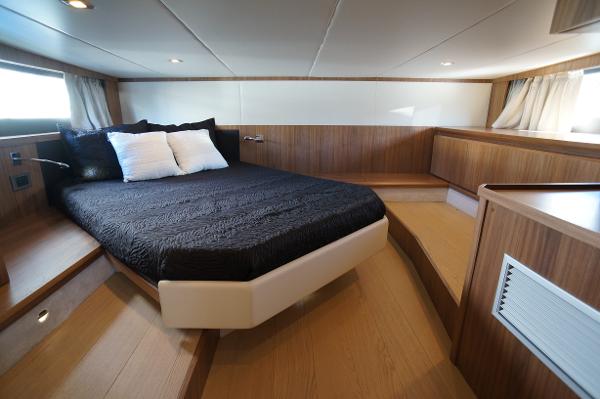 Slide: The Image of Luxurious bedroom interior of 2015 Absolute 40 STL yacht with modern wood finish. - 49