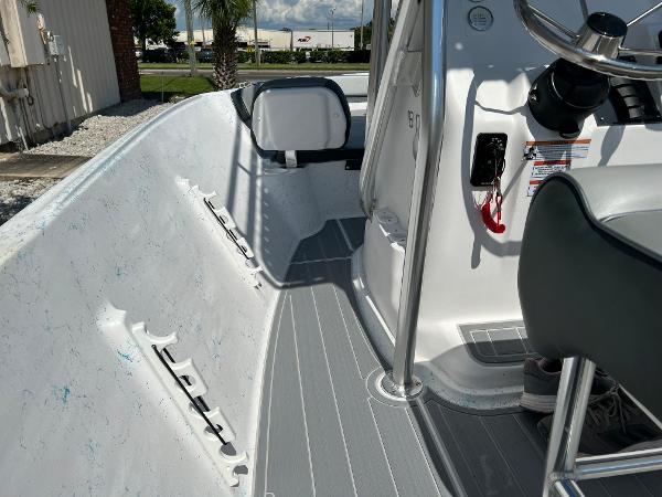 Slide: The Image of 2024 ALK2 Powerboats 18 CRS interior, showing seating and steering console. - 19