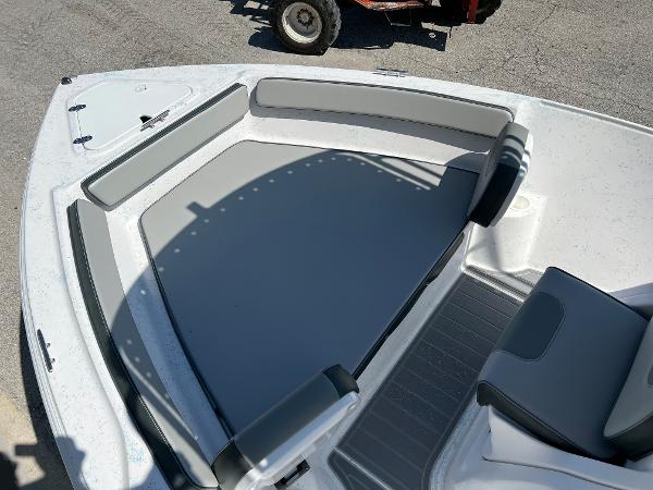 Slide: The Image of 2024 ALK2 Powerboats 18 CRS bow seating area with gray cushions. - 27