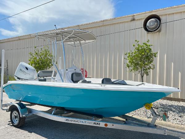 Slide: The Image of 2024 ALK2 Powerboats 18 CRS on trailer, blue hull, Suzuki outboard motor. - 3