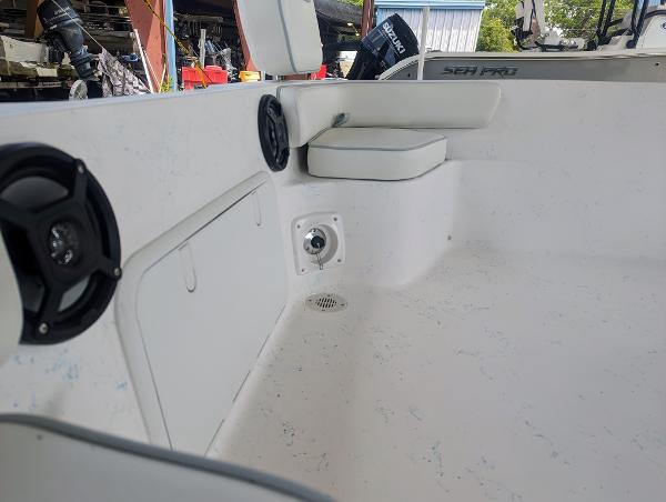 Slide: The Image of 2024 ALK2 Powerboats 22 CRX interior with seating and speaker detail. - 11