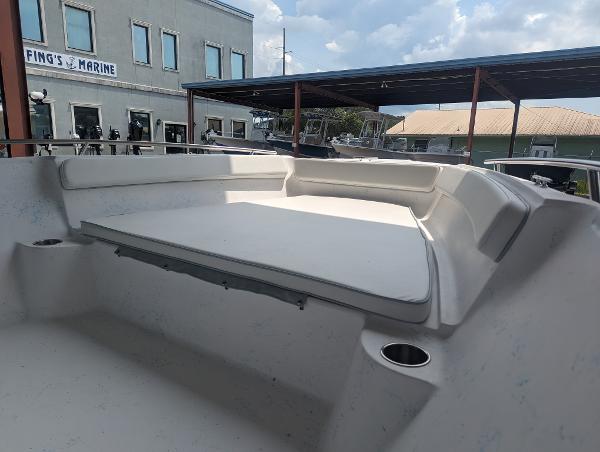 Slide: The Image of 2024 ALK2 Powerboats 22 CRX interior with spacious seating and cup holders. - 13