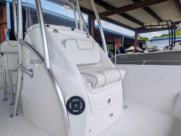 Slide: The Image of 2024 ALK2 Powerboats 22 CRX interior with white seating and sleek design. - 14