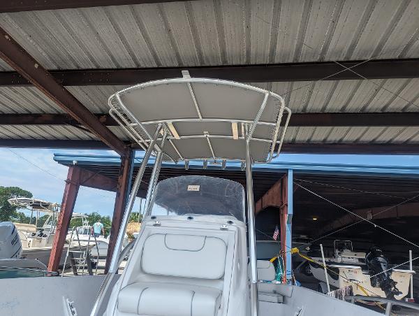 Slide: The Image of 2024 ALK2 Powerboats 22 CRX under a metal roof in a marina. - 15