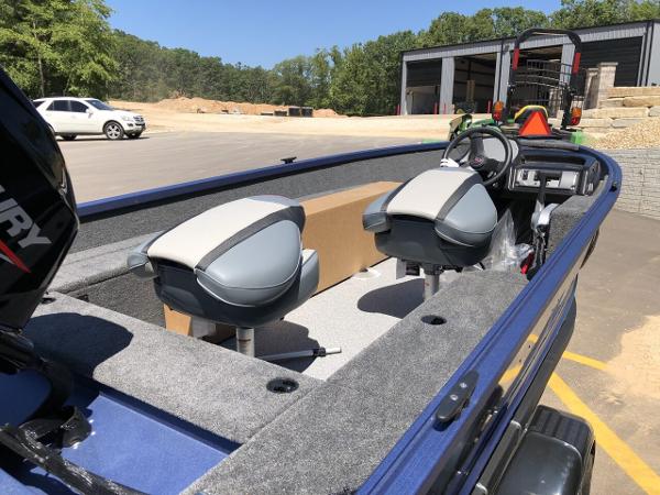 Slide: The Image of 2024 Alumacraft 165 Escape CS boat interior with two seats and steering console. - 8