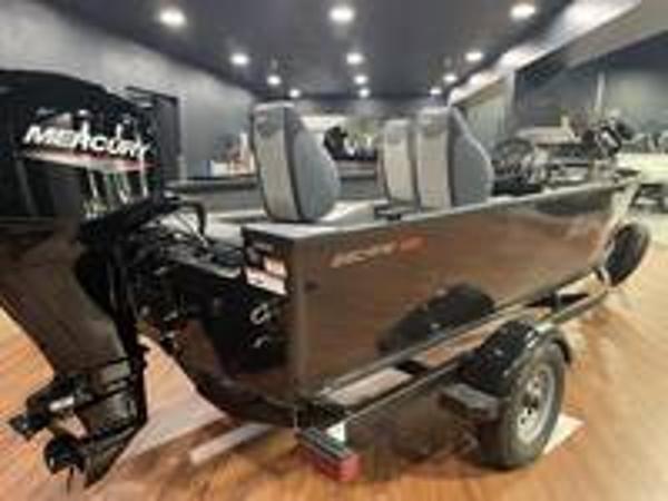 Slide: The Image of 2023 Alumacraft Escape 165 CS fishing boat with Mercury outboard motor. - 2