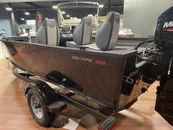 Slide: The Image of 2023 Alumacraft Escape 165 CS fishing boat on display indoors. - 4