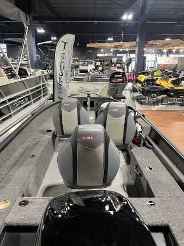 Slide: The Image of 2023 Alumacraft Escape 165 CS boat interior with seating, displayed in showroom. - 8