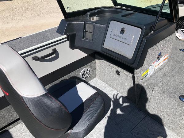 Slide: The Image of Interior of 2024 Alumacraft Trophy 195 boat showing seating and dashboard. - 11