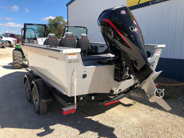 Slide: The Image of 2024 Alumacraft Trophy 195 boat with outboard motor on trailer. - 6