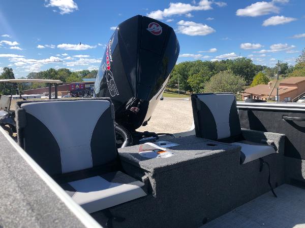 Slide: The Image of 2024 Alumacraft Trophy 195 boat interior with Mercury outboard motor. - 9