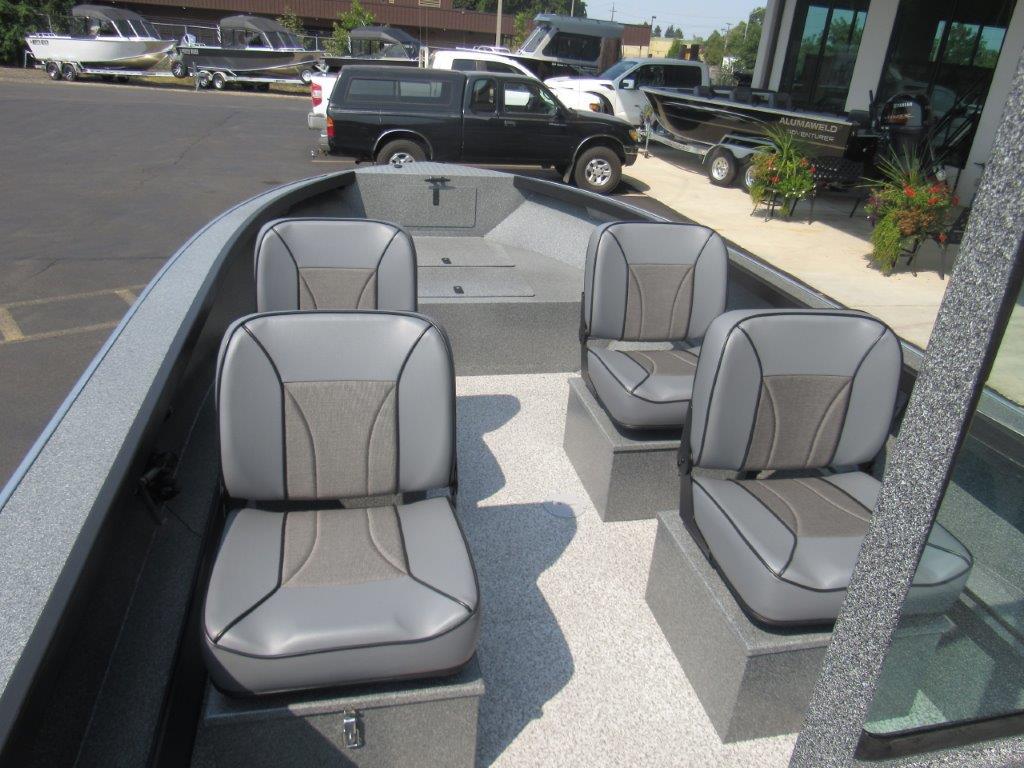 Slide: The Image of 2024 Alumaweld 20 ADVENTURER boat interior with four gray seats. - 12