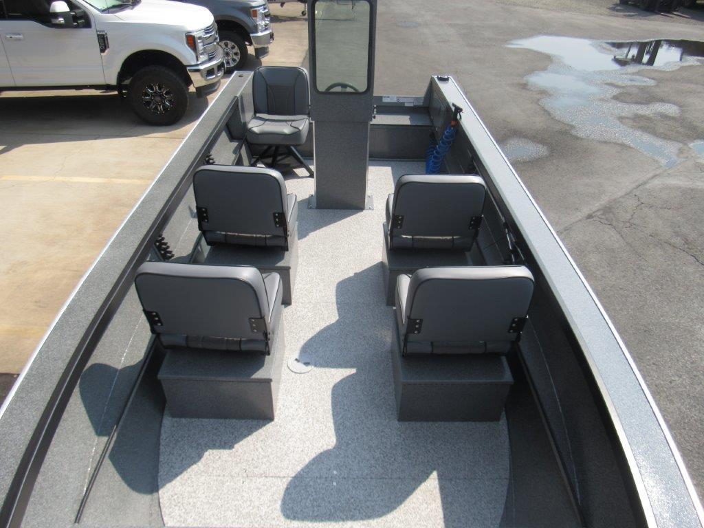 Slide: The Image of 2024 Alumaweld 20 ADVENTURER boat interior with four seats and steering console. - 14