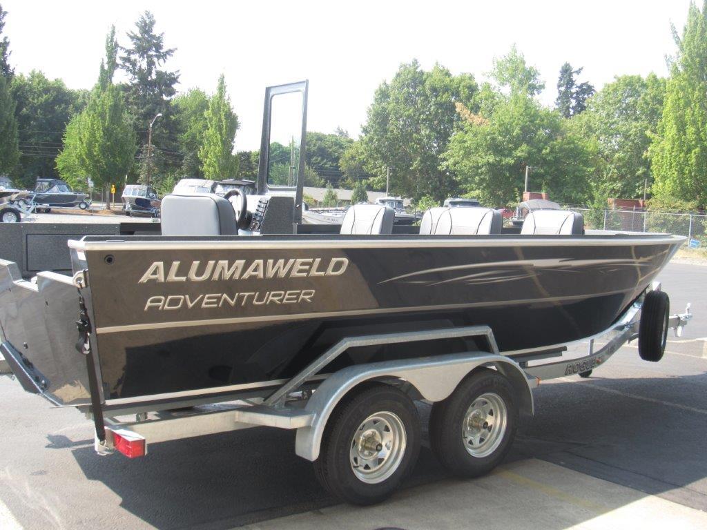 Slide: The Image of 2024 Alumaweld 20 Adventurer boat on a trailer in an outdoor setting. - 5