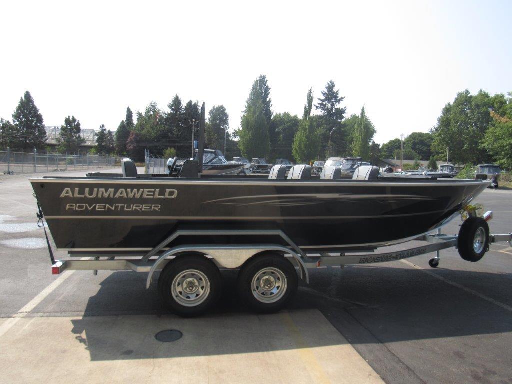 Slide: The Image of 2024 Alumaweld 20 Adventurer boat on trailer in parking lot. - 6