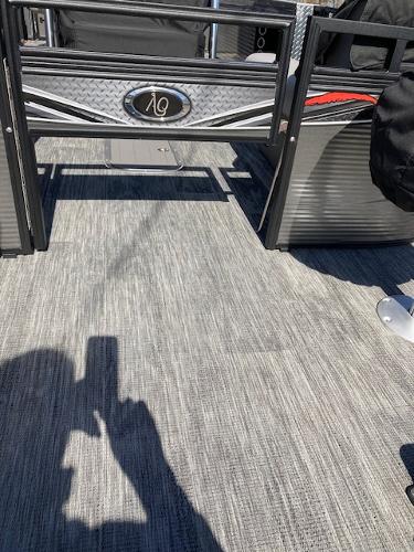 Slide: The Image of 2023 Angler Qwest PRO FISH N CRUISE 8522/24 boat deck with shadow. - 9