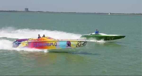 Slide: The Image of 1991 Apache POKER RUN CUSTOM speedboats racing on water. - 1