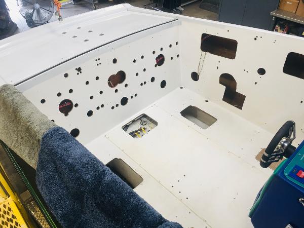 Slide: The Image of 1991 Apache POKER RUN CUSTOM boat interior under restoration in a workshop. - 25