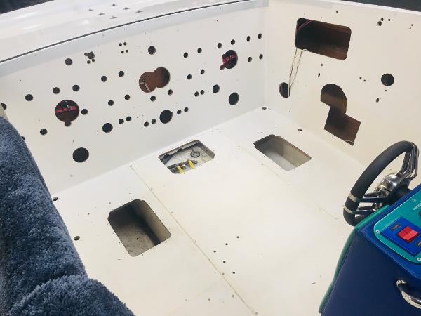 Slide: The Image of 1991 Apache Poker Run Custom boat dashboard and interior under renovation. - 28