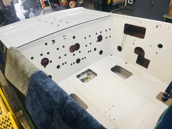 Slide: The Image of 1991 Apache POKER RUN CUSTOM boat interior under restoration in a workshop. - 29