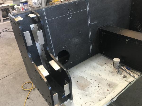 Slide: The Image of 1991 Apache POKER RUN CUSTOM boat under construction in a workshop. - 32