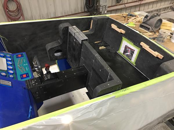 Slide: The Image of 1991 Apache POKER RUN CUSTOM boat interior under construction in a workshop. - 34