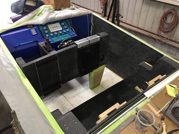 Slide: The Image of 1991 Apache POKER RUN CUSTOM boat interior under construction in a workshop. - 37