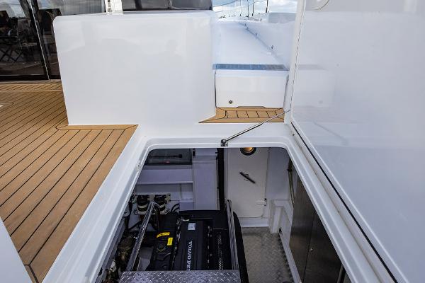 Slide: The Image of Engine compartment of 2023 Aquila 70 Luxury yacht with teak deck. - 24