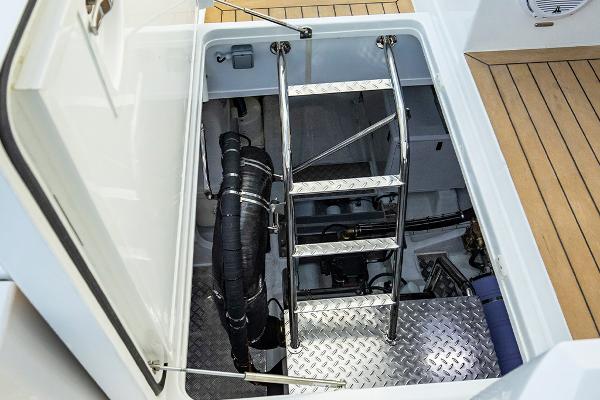 Slide: The Image of Engine room access hatch with ladder on 2023 Aquila 70 Luxury yacht. - 25