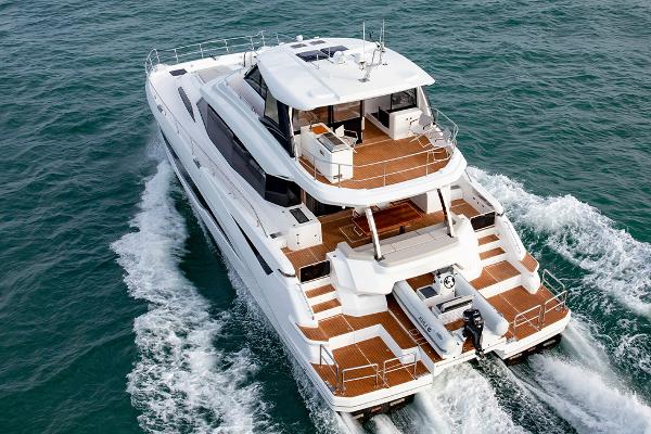 Slide: The Image of Aquila 70 Luxury 2023 yacht cruising on the ocean, aerial view. - 5