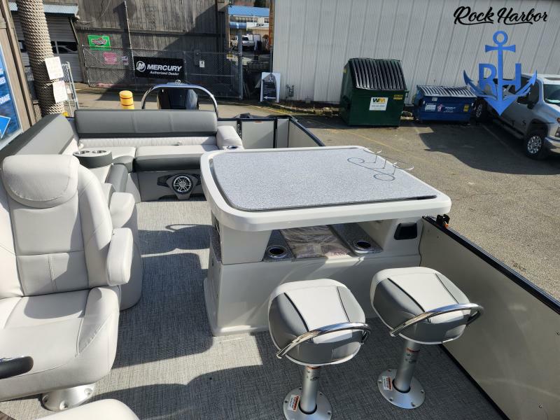 Slide: The Image of 2023 Avalon 2585 Catalina Entertainer pontoon boat interior with seating and table. - 12