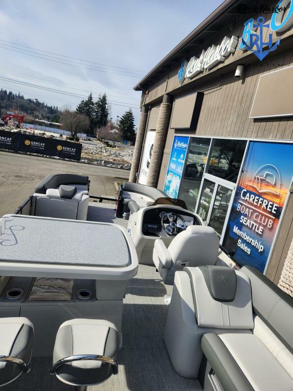 Slide: The Image of 2023 Avalon 2585 Catalina Entertainer boat displayed at dealership. - 19