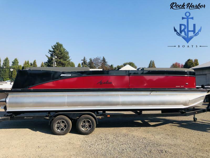Slide: The Image of 2023 Avalon 2585 Catalina Entertainer pontoon boat on trailer at Rock Harbor Boats. - 2