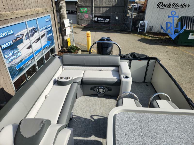 Slide: The Image of 2023 Avalon 2585 Catalina Entertainer pontoon boat interior with gray seating and cup holders. - 6