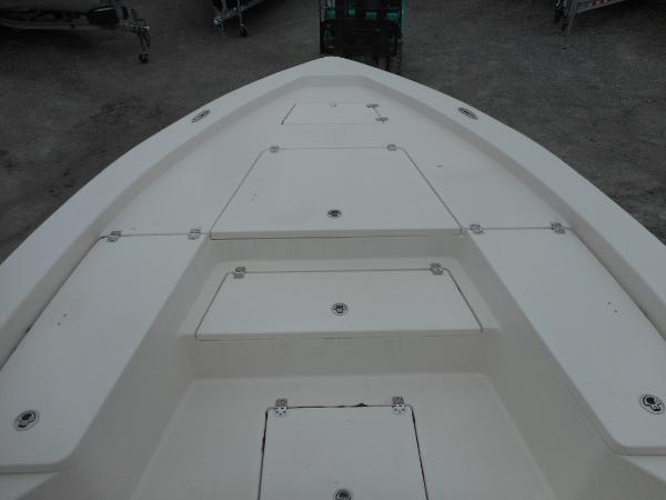 Slide: The Image of 2024 Avenger 26 Avenger boat deck with storage compartments. - 11