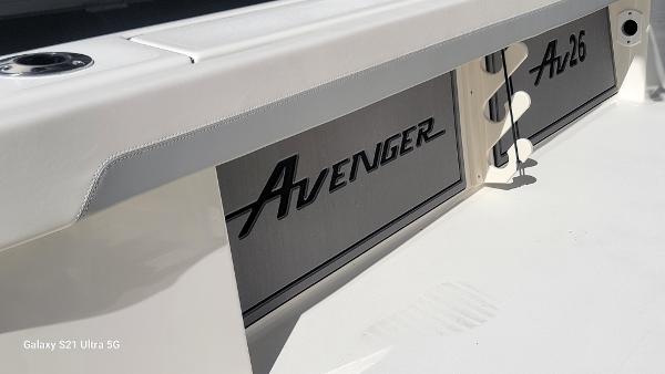 Slide: The Image of 2024 Avenger AV26 boat interior detail with logo and model number. - 20