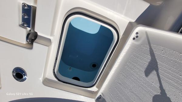 Slide: The Image of 2024 Avenger AV26 boat storage compartment. - 23