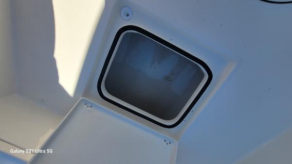 Slide: The Image of 2024 Avenger AV26 boat storage compartment. - 8