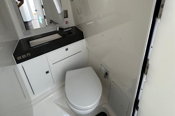Slide: The Image of 2024 Aviara AV36 boat bathroom with modern fixtures and sleek design. - 12