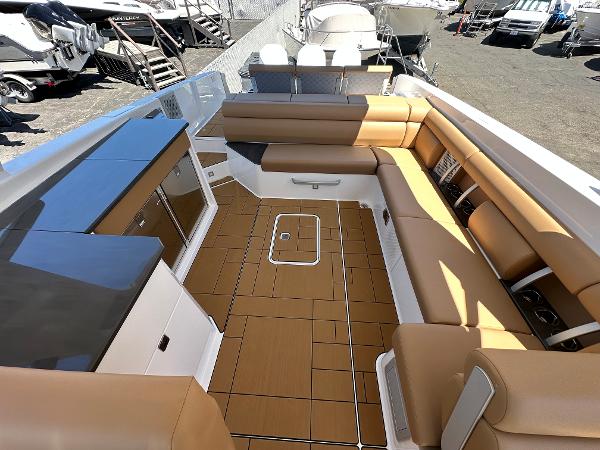 Slide: The Image of 2024 Aviara AV36 boat interior with tan seating and modern amenities. - 5
